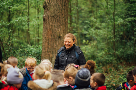 Group of schoolchildren with a volunteer at BBOWT