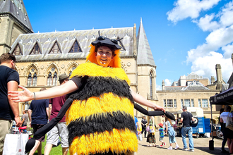 Woman in bee costume