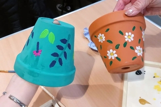 Two painted plant pots