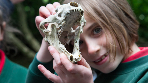 Girl with badger skull