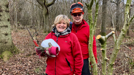 Two people in a woodland