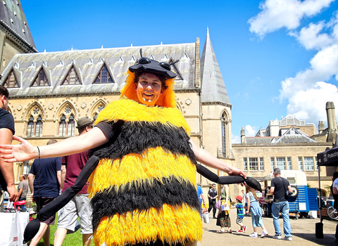 Woman in bee costume