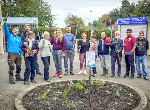 BBOWT Community Wildlife Officer Ed Munday (left) with residents of Southcote, Reading, planting herbs and flowers at Coronation Square as part of the Trust's Nextdoor Nature project. Picture: Kate Titford