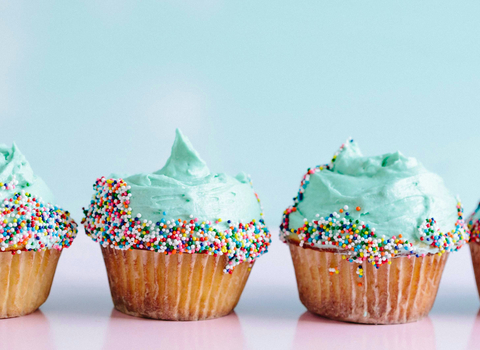 Colorful iced cupcakes